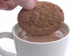 Slow Motion Biscuit Dunk Stock Footage