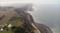 Flight Past Cliffs And Bunker  - Aerial View - Lower Normandy, Calvados, Arrondissement de Bayeux, France Stock Footage
