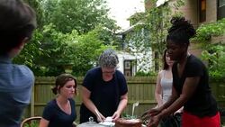 MS PAN ZO Family on patio in backyard of home celebrating teenage daughters birthday Stock Footage