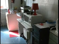 Families mark year living in abandoned hospital News Clip