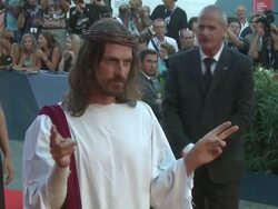 Guest dressed like Jesus Christ at Passion Premiere: 69th Venice Film Festival at Sala Grande on September 07, 2012 in Venice, Italy (Footage by WireImage Video/Getty Images) Stock Footage