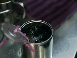 CU Coffee seller  pouring a take-away coffee in a can Stock Footage
