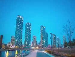 WS POV TS T/L View of Central Park and Songdo Business District at day and night / Songdo, Incheon, South Korea Stock Footage