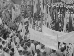 Koreans celebrate May Day in front of leader Kim II Sung Stock Footage