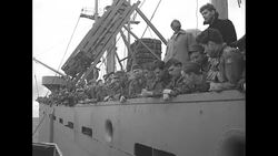 Returning GIs temporarily stranded in Atlantic Ocean are rescued by Army transport ship USAT Saturnia News Clip