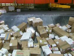 MS Parcels are sorted on conveyor belt in FedEx Depot / Memphis, Tennessee, United States Stock Footage