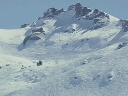 WS AERIAL View of Parasail skiing / Switzerland Stock Footage