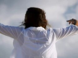 Woman stretching on beach Stock Footage