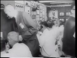 B/W 1961 row of men at control panels in mission control / Mercury 4 Stock Footage