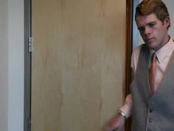 Young Male Executive Enters Door, Smiles and Walks Away Stock Footage