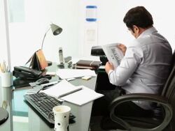 Businessman reading a paper  Stock Footage