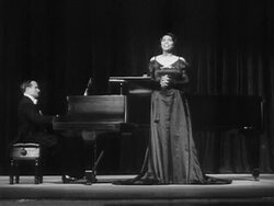 1951 Wide shot Marian Anderson singing onstage next to pianist during performance/ USA  Stock Footage