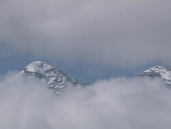 WS View of two Peaks looking through dense Clouds / Tengboche,  Khumbu Region, Nepal Stock Footage