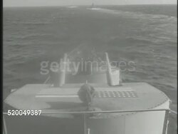 1949: UNITED STATES NAVY SEVENTH FLEET: VS U.S. Navy 7th Fleet battleships & warships at sea, seamen watching ship from deck. Instructional Video