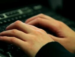 Woman Typing on a Computer Keyboard Stock Footage