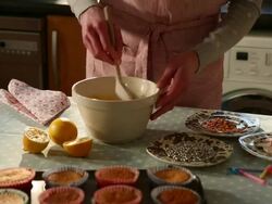 MS Shot of woman checking glazing mixture for cupcake / London, Greater London, United Kingdom Stock Footage