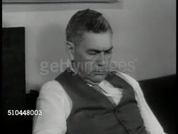 1950: U.S. LISTENING TO TRUMAN: VS Family members around radio, radio dial, U.S. President Harry S. Truman VO '...a warning that there may be similar acts of aggression... build up army, navy & air force...' Korean War Instructional Video