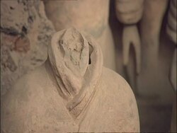 Detail of headless Terracotta Warrior, Museum of Qin, Xian, China Stock Footage
