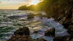 SLO MO Beautiful Rocky Coastline At Sunset Stock Footage