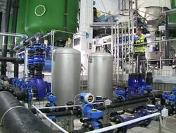 MS PAN Worker working in decalcifying plant at water works / Konz, Rhineland-Palatinate, Germany Stock Footage