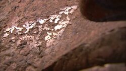 Stone crumbles at the base of a statue in Luxor, Egypt. Stock Footage