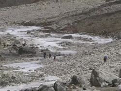 MS ZO View of Route to Everest Basecamp and people walking in Khumbu(Glacier) Valley / Thokla, Khumbu Region, Nepal Stock Footage