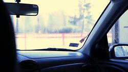 Man washing car windshield Stock Footage