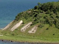WS AERIAL View of light house located on island / Hiddensee, Mecklenburg-Vorpommern, Germany Stock Footage