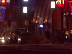 MS Cars rolling on streets with snow atmosphere at night / Minneapolis, Minnesota, United States Stock Footage