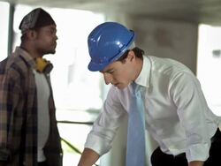 HD: Architect Examining The Blueprints Stock Footage