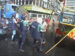 One dead after riot police use batons to break up stone-throwing protesters News Clip
