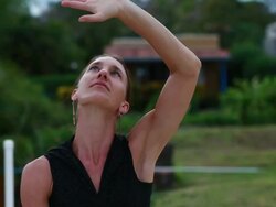 MS Shot of sitting woman dancing her hand / Montezuma, Costa Rica Stock Footage