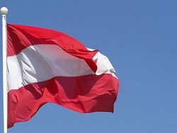 CU SLO MO Austrian flag waving in wind / Caen, Normandy, France Stock Footage