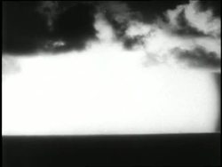 A mushroom cloud explodes in the sky over Hiroshima, Japan in 1945. News Clip