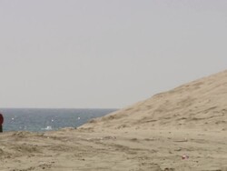 MS Shot of People walking around on the beach / Doha, Qatar  Stock Footage