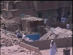 Massive boulders peeled away from a cliff and buried dozens of homes in an Egyptian shanty town Saturday, killing at least 18 people News Clip