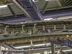 MS Magazines passing on conveyor belt in gravure printing office / Itzehoe, Schleswig-Holstein, Germany  Stock Footage