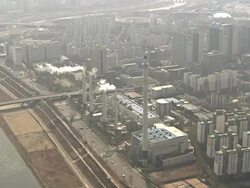 WS AERIAL View of Landscape of Residential Districts and Thermal power plant at Mok dong Seoul / Seoul, South Korea Stock Footage