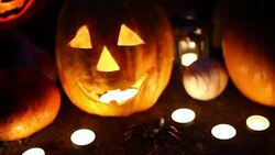 Jack-o-lantern on a dark background Stock Footage