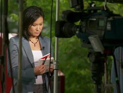 MS Shot of television news crew preparating for G8 meeting / Hokkaido Toyako, Japan Stock Footage