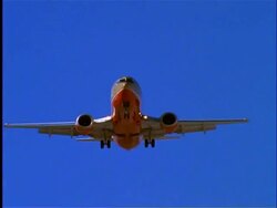 low angle of airliner flying over camera / Mexico Stock Footage