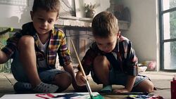 Little boys painting at the artist's studio Stock Footage
