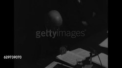 Courtroom views and judges entering courtroom during Nuremberg Trials of Nazi war crimes. News Clip