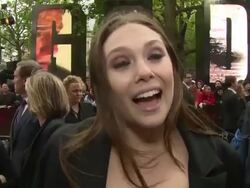 INTERVIEW - Elizabeth Olsen on the role and co-stars at 'Godzilla' Premiere at Odeon Leicester Square on May 11, 2014 in London, England. Stock Footage