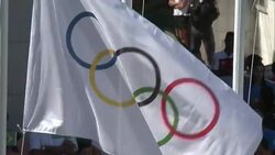 VOICED: Bandera olimpica en la favela News Clip