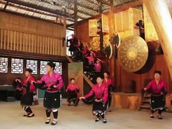 WS Shot of group of women's presenting traditional show AUDIO / Yao Village, Huangluo, China Stock Footage