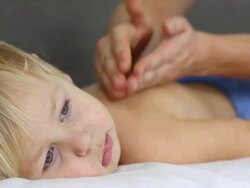 little boy with a massage Stock Footage
