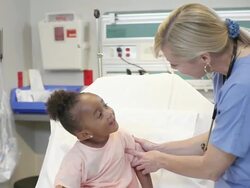Female doctor examining a girl Stock Footage