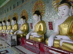 MS Shot of Buddha figures in Umin Thounzeh Pagoda / Sagaing, Mandalay, Mandalay Division, Myanmar Stock Footage
