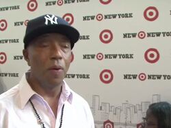 INTERVIEW: Russell Simmons talking about Target in NY, affordable fashion at the Target Celebrates Opening Of East Harlem Location With Star-Studded Party at New York NY.  Stock Footage